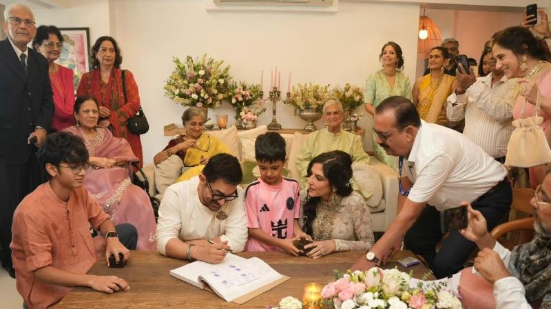 आमिर-गौरी की शादी की पहली तस्वीर आई सामने; बेटे बने रिंग बेयरर, जमीन पर बैठकर कपल ने साइन किए पेपर्स आमिर-गौरी की शादी की पहली तस्वीर आई सामने; बेटे बने रिंग बेयरर, जमीन पर बैठकर कपल ने साइन किए पेपर्स