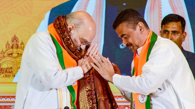 सुवेंदु अधिकारी के हाथ में बंगाल की कमान, गृह मंत्री अमित शाह ने किया सुवेंदु अधिकारी के हाथ में बंगाल की कमान, गृह मंत्री अमित शाह ने किया